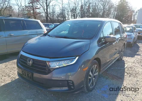 2023 Honda Odyssey Touring z USA, uszkodzony, nr VIN 5FNRL6H87PB032578